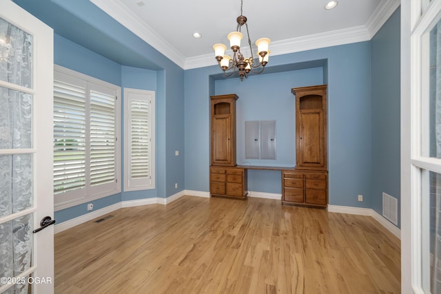 1704 Liam St, Carthage, MO 64836 - unfurnished dining area with light wood finished floors, baseboards, a chandelier, ornamental molding, and recessed lighting