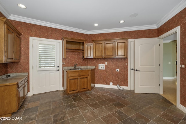 1704 Liam St, Carthage, MO 64836 - kitchen featuring a sink, open shelves, brown cabinetry, dark stone finish floors, and ornamental molding