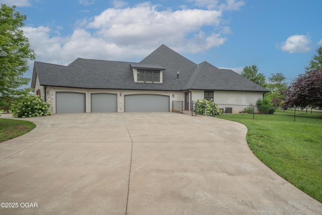 1704 Liam St, Carthage, MO 64836 - view of front of property with concrete driveway, a shingled roof, and a garage