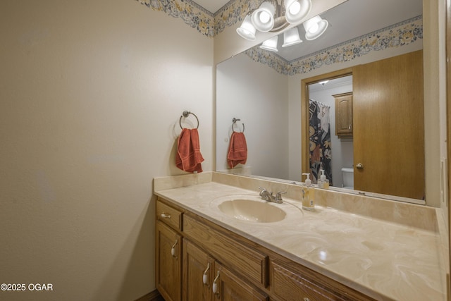201 Canary Ln, Commerce, OK 74339 - bathroom with vanity and toilet