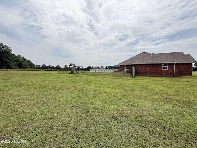 201 Canary Ln, Commerce, OK 74339 - view of yard with a playground