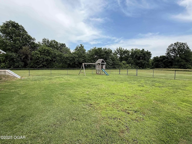 201 Canary Ln, Commerce, OK 74339 - view of yard with a playground