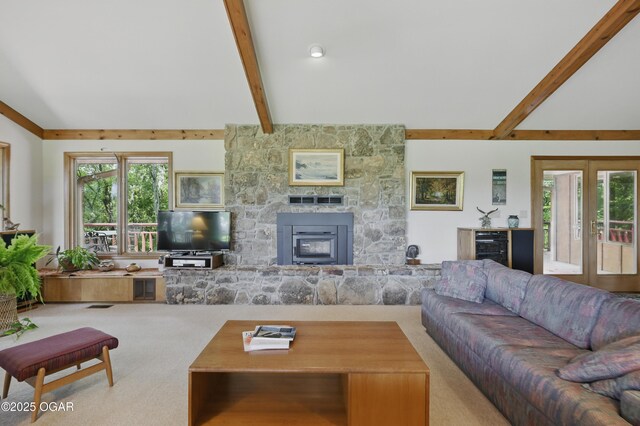 13495 Dogwood Rd, Carthage, MO 64836 - living area featuring carpet floors, healthy amount of natural light, a stone fireplace, and beverage cooler