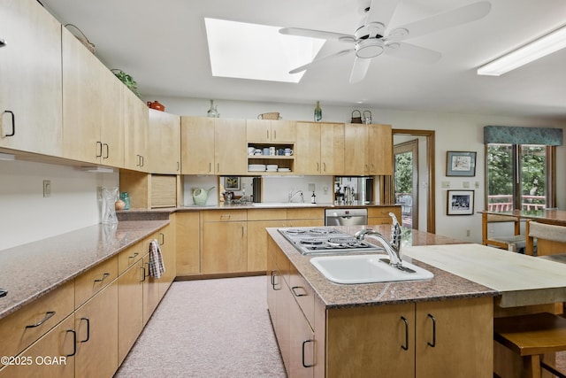 13495 Dogwood Rd, Carthage, MO 64836 - kitchen with a sink, light brown cabinetry, dishwasher, and a center island with sink
