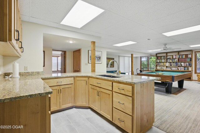 13495 Dogwood Rd, Carthage, MO 64836 - kitchen with a sink, light brown cabinetry, light stone counters, a paneled ceiling, and ceiling fan