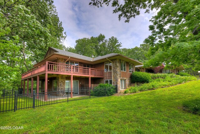 13495 Dogwood Rd, Carthage, MO 64836 - rear view of property with stone siding, a deck, and board and batten siding