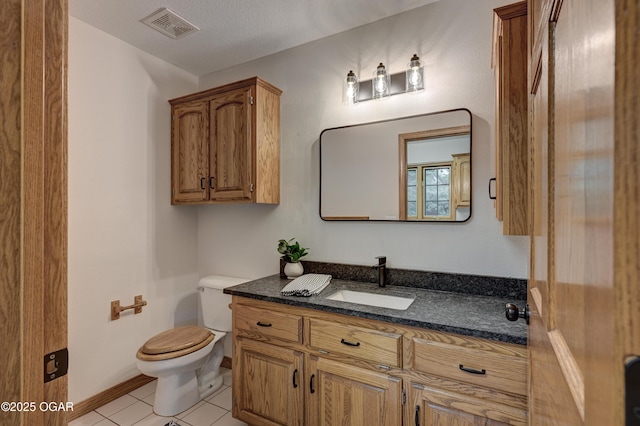 1330 Stoneledge Ln, Neosho, MO 64850 - half bath with toilet, vanity, and tile patterned floors