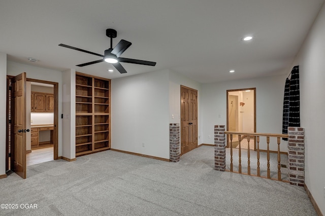 1330 Stoneledge Ln, Neosho, MO 64850 - carpeted spare room with recessed lighting, baseboards, a ceiling fan, a smoke detector, and built in shelves