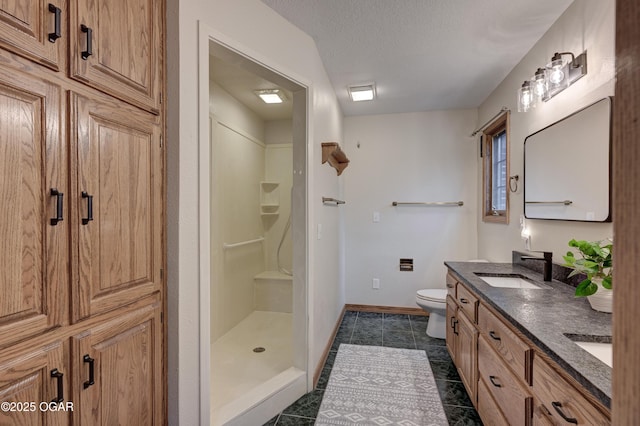 1330 Stoneledge Ln, Neosho, MO 64850 - full bath with double vanity, toilet, tile patterned floors, a walk in shower, and baseboards