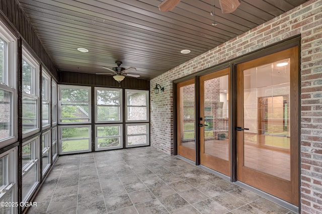 1330 Stoneledge Ln, Neosho, MO 64850 - unfurnished sunroom featuring a ceiling fan, french doors, and healthy amount of natural light
