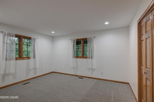 1330 Stoneledge Ln, Neosho, MO 64850 - empty room with carpet flooring, plenty of natural light, recessed lighting, and baseboards