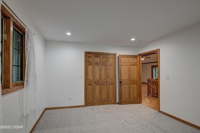 1330 Stoneledge Ln, Neosho, MO 64850 - unfurnished bedroom featuring carpet, recessed lighting, baseboards, and a closet