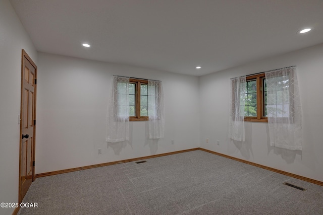 1330 Stoneledge Ln, Neosho, MO 64850 - carpeted spare room featuring plenty of natural light, recessed lighting, and baseboards