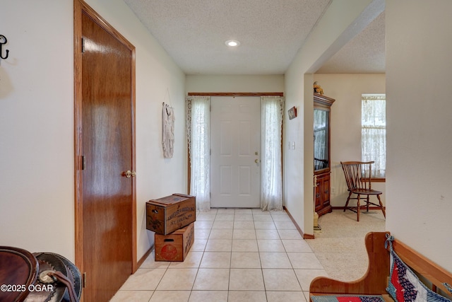 16050 Alford Ln, Diamond, MO 64840 - entryway with a textured ceiling and light tile patterned flooring