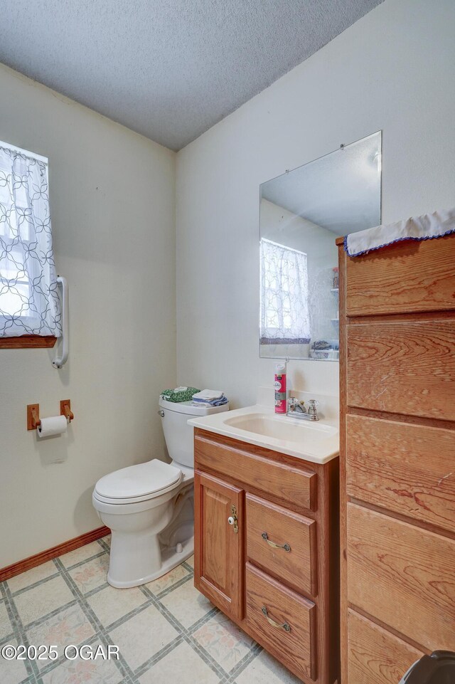 16050 Alford Ln, Diamond, MO 64840 - bathroom featuring vanity and a textured ceiling