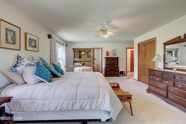 16050 Alford Ln, Diamond, MO 64840 - bedroom featuring light carpet, a ceiling fan, and a textured ceiling