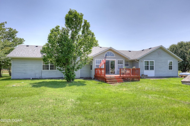 16050 Alford Ln, Diamond, MO 64840 - back of property with a wooden deck, a lawn, and roof with shingles