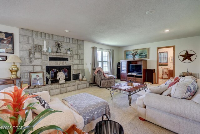16050 Alford Ln, Diamond, MO 64840 - living room with a textured ceiling, a fireplace, carpet flooring, and recessed lighting
