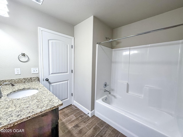 815 Delaney Dr, Carl Junction, MO 64834 - full bath with wood tiled floors, bathtub / shower combination, and vanity