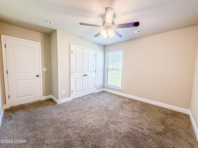 815 Delaney Dr, Carl Junction, MO 64834 - unfurnished bedroom with carpet flooring, a closet, and a ceiling fan