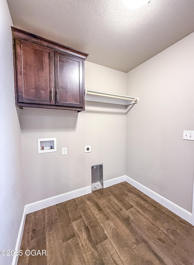 815 Delaney Dr, Carl Junction, MO 64834 - laundry area featuring washer hookup, electric dryer hookup, dark wood-style floors, a textured ceiling, and cabinet space