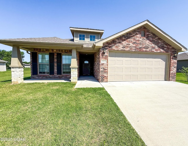 815 Delaney Dr, Carl Junction, MO 64834 - view of front of house featuring brick siding, a front lawn, an attached garage, and driveway