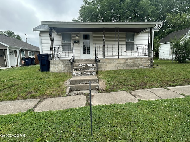 421 N Webb St, Webb City, MO 64870 - view of front of home featuring covered porch and a front lawn