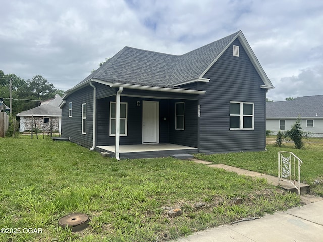 1816 S Connor Ave, Joplin, MO 64804 - view of front of home with a shingled roof and a porch