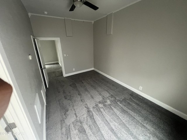 1816 S Connor Ave, Joplin, MO 64804 - empty room featuring dark carpet, ceiling fan, baseboards, and crown molding
