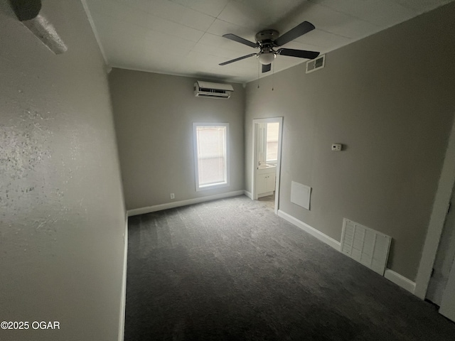 1816 S Connor Ave, Joplin, MO 64804 - carpeted empty room featuring a wall mounted AC, ceiling fan, and baseboards