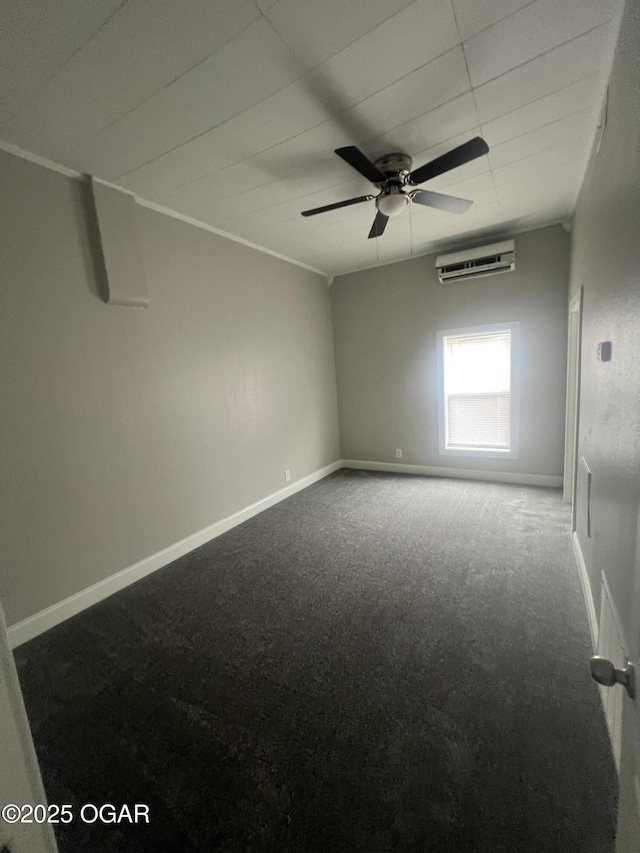 1816 S Connor Ave, Joplin, MO 64804 - carpeted spare room featuring an AC wall unit, ceiling fan, baseboards, and a drop ceiling