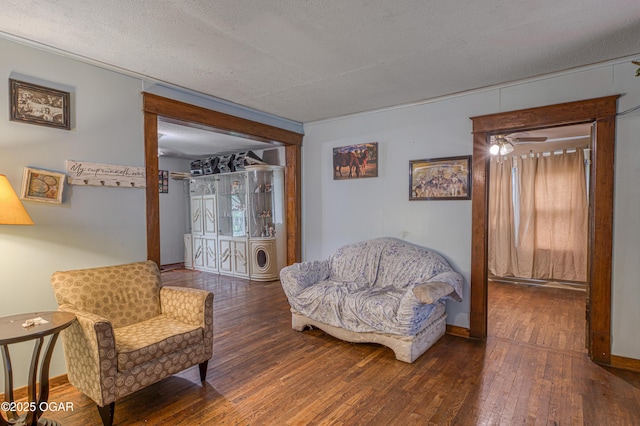 17279 Jackpine Rd, Carthage, MO 64836 - sitting room featuring hardwood / wood-style floors, a textured ceiling, baseboards, and ceiling fan