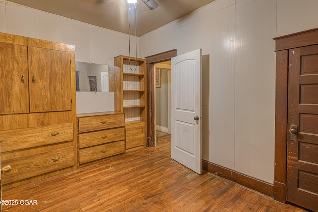 17279 Jackpine Rd, Carthage, MO 64836 - unfurnished bedroom with wood finished floors and baseboards