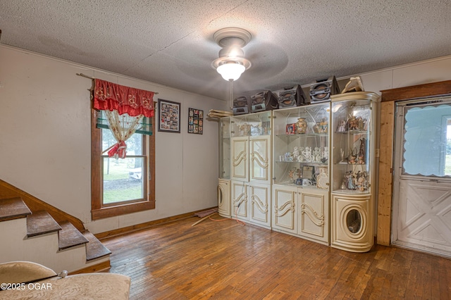 17279 Jackpine Rd, Carthage, MO 64836 - sitting room with hardwood / wood-style floors, a textured ceiling, stairs, and ceiling fan