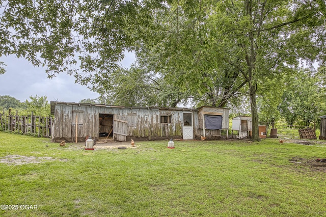17279 Jackpine Rd, Carthage, MO 64836 - back of house featuring an outdoor structure and a pole building
