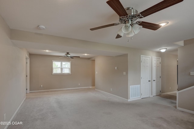 2521 Wisconsin Ave, Joplin, MO 64804 - unfurnished room with a ceiling fan, light colored carpet, and baseboards