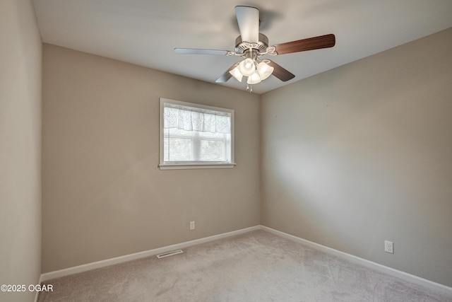 2521 Wisconsin Ave, Joplin, MO 64804 - spare room with light carpet, baseboards, and a ceiling fan