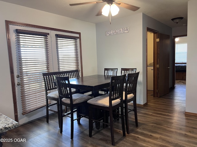 2038 W Trolley Car Ln, Carthage, MO 64836 - dining room featuring ceiling fan and dark wood-type flooring