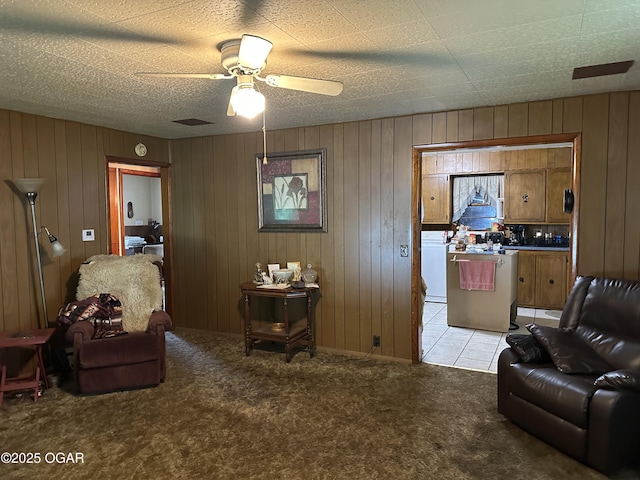 1003 Adams Ave, Seneca, MO 64865 - living area featuring light carpet and ceiling fan