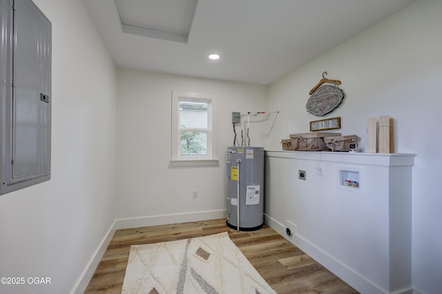 207 S Hall St, Webb City, MO 64870 - laundry room featuring hookup for an electric dryer, electric water heater, electric panel, washer hookup, and attic access