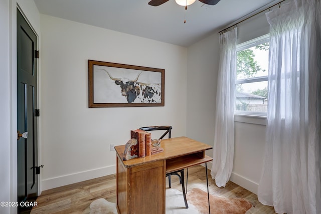 207 S Hall St, Webb City, MO 64870 - office area with a ceiling fan, baseboards, and light wood-style floors