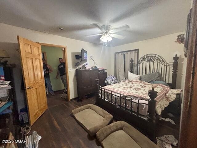 241 SE 40th Rd, Lamar, MO 64759 - bedroom featuring dark wood-style floors and a ceiling fan