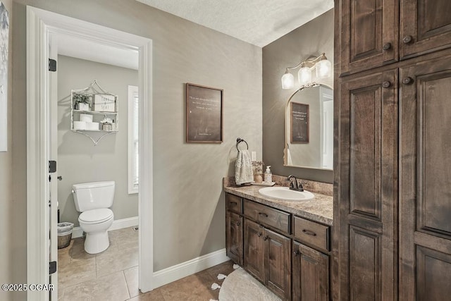 7870 County Lane 287, Carl Junction, MO 64834 - bathroom with vanity, toilet, baseboards, and tile patterned floors