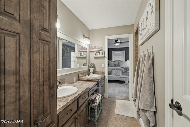 7870 County Lane 287, Carl Junction, MO 64834 - full bathroom with vanity, ensuite bath, a ceiling fan, and tile patterned floors