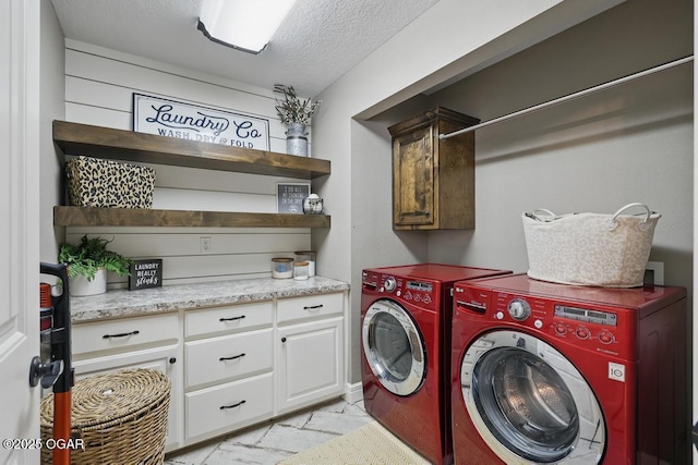 7870 County Lane 287, Carl Junction, MO 64834 - washroom featuring cabinet space, separate washer and dryer, and a textured ceiling