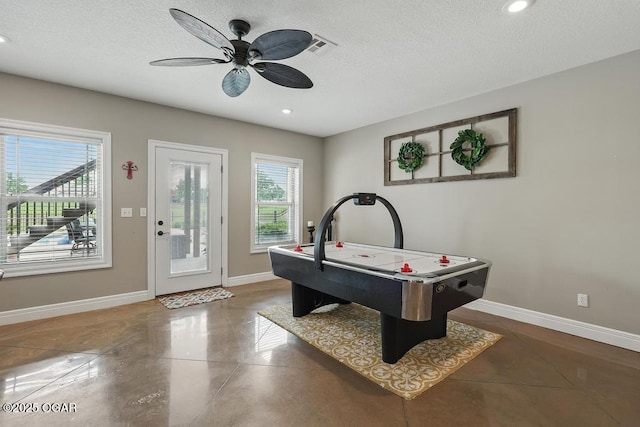 7870 County Lane 287, Carl Junction, MO 64834 - recreation room with a ceiling fan, baseboards, a textured ceiling, and recessed lighting