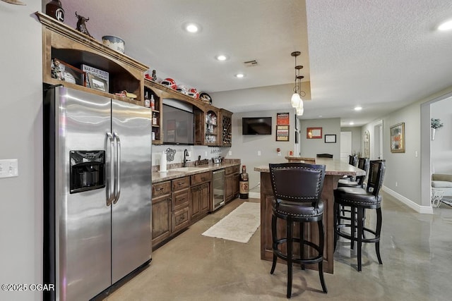 7870 County Lane 287, Carl Junction, MO 64834 - kitchen featuring stainless steel fridge, open shelves, a sink, recessed lighting, and finished concrete floors