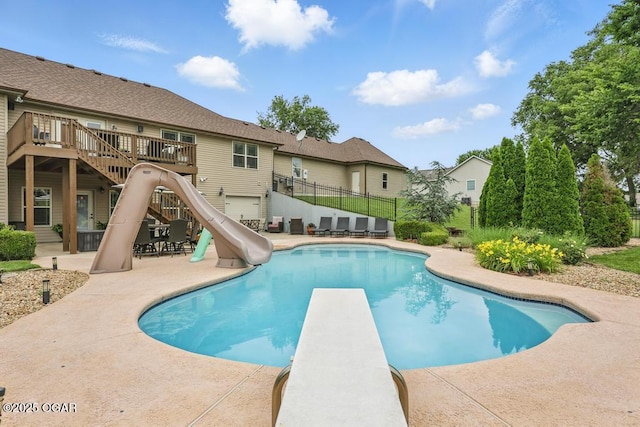7870 County Lane 287, Carl Junction, MO 64834 - view of swimming pool with a water slide, a patio area, a diving board, and stairs