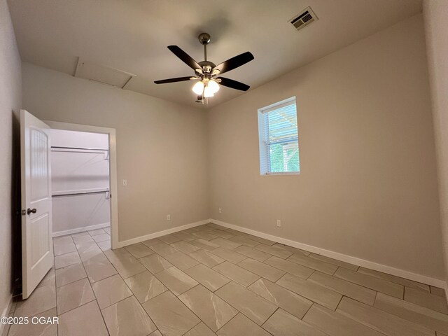 204 Webb St, Duenweg, MO 64841 - spare room featuring attic access, a ceiling fan, baseboards, and light marble finish floors