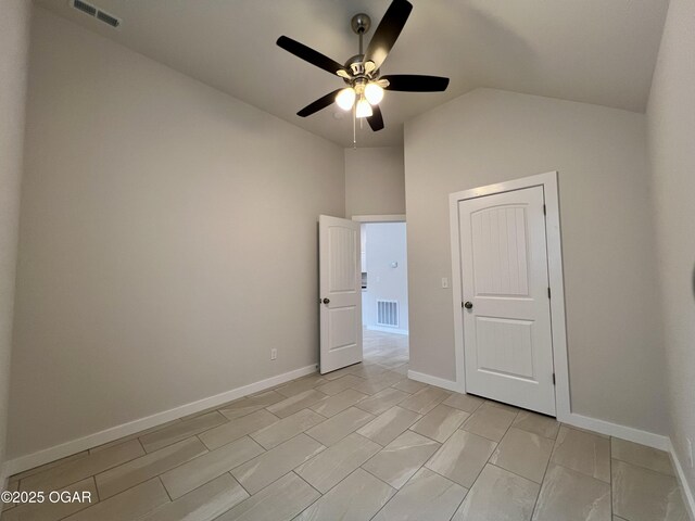 204 Webb St, Duenweg, MO 64841 - unfurnished bedroom featuring vaulted ceiling, baseboards, and a ceiling fan